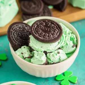 Creamy Andes Mint Chocolate Dip Recipe with dippers including strawberries and graham crackers